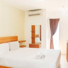 Cozy Studio at Bassura City Apartment By Travelio