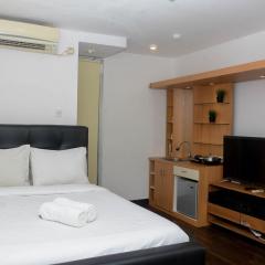 Fully Furnished with Cozy Design Studio Bassura City Apartment By Travelio