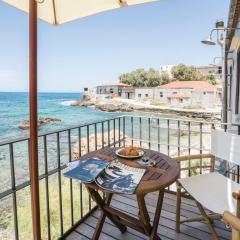kito- transformed house on the water's edge
