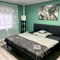 Appartement 3 - geräumige Wohnung mit eigener Küche, Bad und Gartenblick