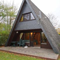 Zeltdachhaus mit Parkplatz vor der Haustür