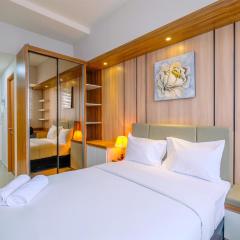 Cozy Living Studio at Evenciio Margonda Apartment near UI By Travelio