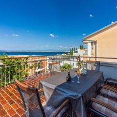 Komfortables Apartment nur 250 Meter zum Sandstrand mit privater Dachterrasse und Meerblick