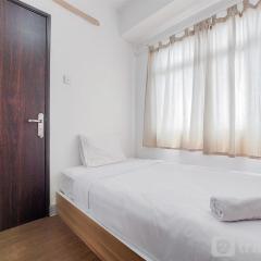 Modern Look and Comfortable 2BR Serpong Greenview Apartment By Travellio
