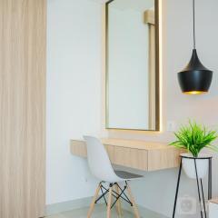 Comfy and Minimalist Studio at Embarcadero Bintaro Apartment By Travelio