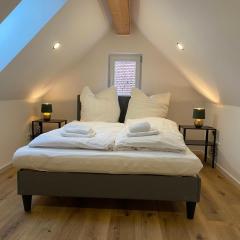 Dachgeschosswohnung im Zentrum - Claycation