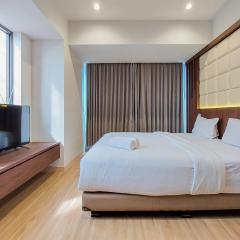 Nice and Spacious 2BR with Extra Room at Branz BSD City Apartment By Travelio