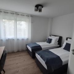 Apartments Seibel Doppel-Zweibettzimmer mit Bad