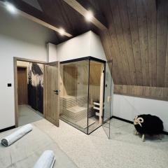 Osada Kaniówka - domki pod stokiem z sauna