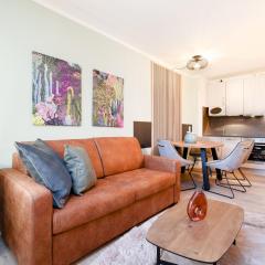Das Solaris 3 Beach Apartment mit Balkon, Gemeinschaftssauna und Grillplatz