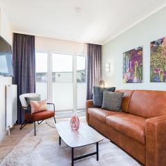 Das Solaris 5 Beach Apartment mit Balkon, Gemeinschaftssauna und Grillplatz