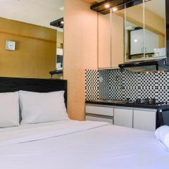 Cozy Stay Studio Room at Green Pramuka City Apartment By Travelio