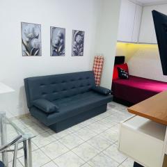 Sala living em prédio Familiar na Av da Praia