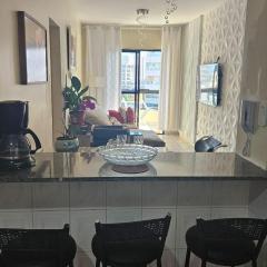 Apartamento aconchegante a 100m da praia