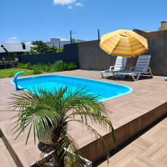 Casa ,piscina há 100 metros do mar ,24 pessoas