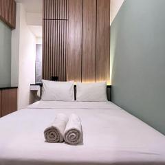 Warm and Homey 2BR at Vida View Makassar Apartment By Travelio