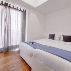 Cozy Living 2BR Apartment at Casa de Parco By Travelio