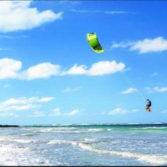 Modern beach stay, comfort steps from Luquillo beach, private jacuzzi