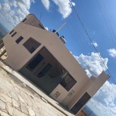 Casa vista da montanha