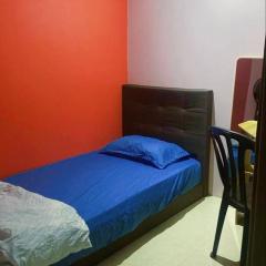 Cozy single bedroom with shared bathroom