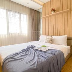 Modern Look 2BR at Puri Garden Apartment By Travelio