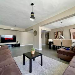 The Premium Spot - 4 BR Steps from TGV