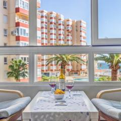 Sunny beachfront apartment with pool and aircon