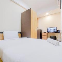 Homey and Modern Studio Apartment B Residence By Travelio