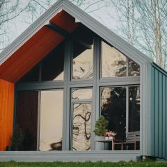 Sniegi design cabin with sauna