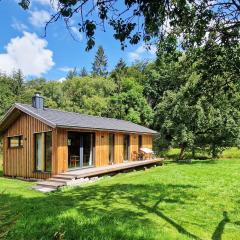 Holzhaus mit Kamin - Am Forellenfluss