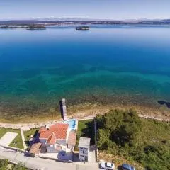 Four-Bedroom Holiday Home In Tkon
