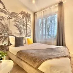 APPARTEMENT 2 chambres avec Jardinet, proche GARES