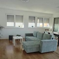Neubau Appartement mit Terasse, privater Eingang,Parkplatz,Küche