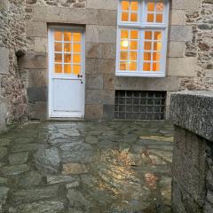 Appart COQUET Intra-Muros façade historique rez de chaussée terrasse
