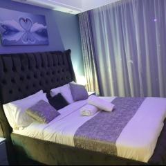 elegant classic apartment with heated swimming pool,modern equipped gym,ample parking space,and a relaxing rooftop with amazing scenic views