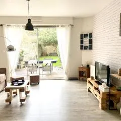 Appartement cosy avec jardin proche centre .