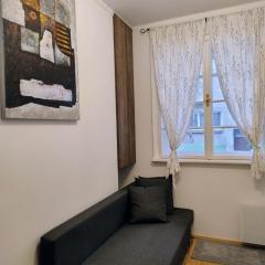 Tiny studio in top center