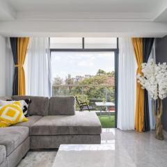 Nivla Executive Cozy haven with gym and Balcony