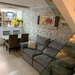 Casa 23 em Condomínio à 700m da Praia dos Astúrias Guarujá - SP