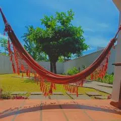 Casa Temporada Ubatuba 7 min praia grande, check-in e out flexíveis com vagas na garagem