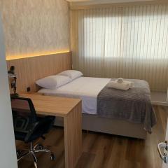 Apto novo com Ar Condicionado bem localizado