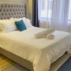 executive newly furnished apartment with private parking space,heated swimming pool ,modern equipped gym and, child play area and a relaxing rooftop with amazing scenic views