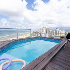 Cobertura a beira mar com piscina e churrasqueira