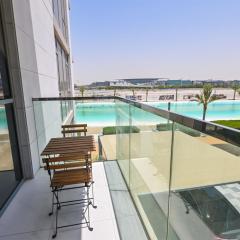 Stunning 1BR Retreat with Crystal Lagoon Views!