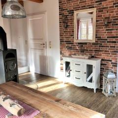 kleine meerZeit, süßes Knusperhäuschen mit Kaminofen