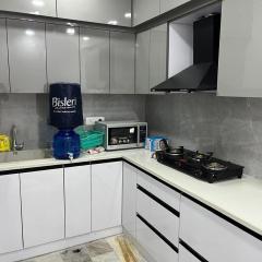 Cozy nest 2bhk by LWB