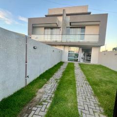 Casa guaratuba com piscina esquerdo