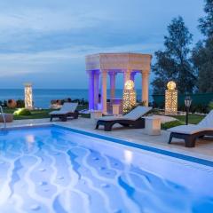 Luxury Beachfront Villa with a Pool