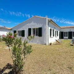 Superbe villa à deux pas des commerces avec jardin