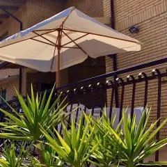 Casa con giardino e terrazzo
